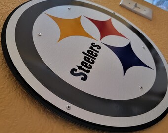 Steelers round wall décor.