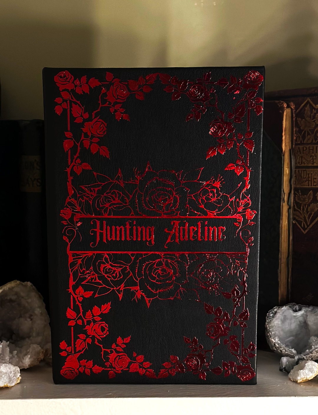 Hunting Adeline Book by H. D. Carlton Custom Book Bind With Red Foil