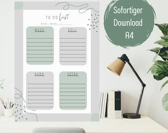 May include: A printable to-do list with four sections labelled "Muss", "Soll", "Kann", and "Extra". The printable is designed in a minimalist style with a grey background and green accents.