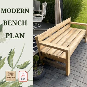 May include: A modern wooden bench with a simple design, perfect for outdoor use. The bench is made of natural wood and has a light brown color. The bench is sitting on a brick patio.