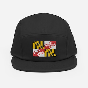 May include: Black 5-panel cap with an embroidered Maryland state flag in yellow, red, and white.