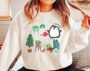 Christmas Penguin Watering Plants Sweatshirt, Christmas Plants Shirt, Plant Parent Gift Penguins Tree Shirt, Holiday Plants, Watering Plants