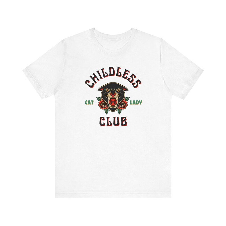 May include: White t-shirt with a black panther head graphic and the text "Childless Cat Lady Club" in red and green.