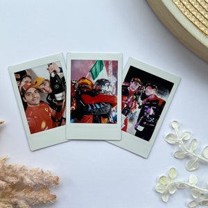 Carlos Sainz y Lando Norris: Impresiones Polaroid INSTAX del podio 1-2 de Singapur