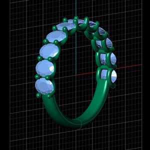 May include: A 3D rendering of a ring with a green band and a series of oval-shaped, light blue gemstones. The ring is set against a black background with a grid pattern, showcasing the design and structure of the jewelry.