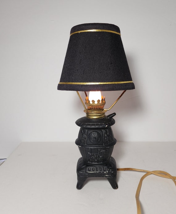 Antique cast 2024 iron lamp