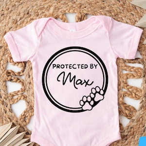 Protected By Dog One Piece, Custom One Piece, Baby Shower Gift, Personalized Dog Name One Piece, Baby Gift, Custom Dog Baby One Piece