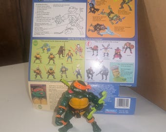 1989 rock-'n'-roll Michaelangelo TMNT action figure loose complete with weapons -excellent condition - vintage playmates TMNT toy