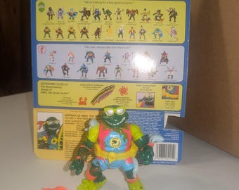 1990 Mike the Sewer Surfer TMNT action figure loose - complete with weapons -excellent condition - vintage playmates TMNT toy