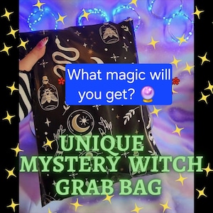May include: A black rectangular grab bag featuring a white celestial and occult pattern of moons, stars, moths, and potion bottles. The text on the bag reads: What magic will you get? UNIQUE MYSTERY WITCH GRAB BAG. The bag has a smooth, opaque finish.