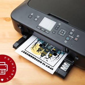 page from the Halloween activity book being printed