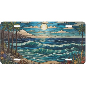 Puede incluir: Una ilustración colorida de estilo vitral que representa una escena de playa con palmeras, olas y un sol amarillo brillante en el cielo.