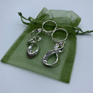 Still With You Keychains & Necklaces