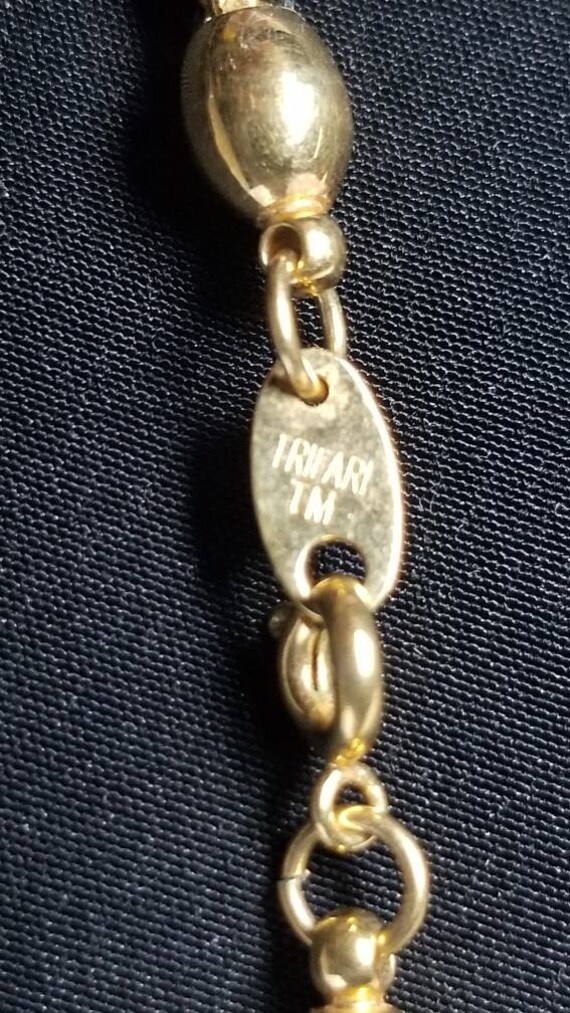 Genuine Trifari gold tone & black necklace. - image 4