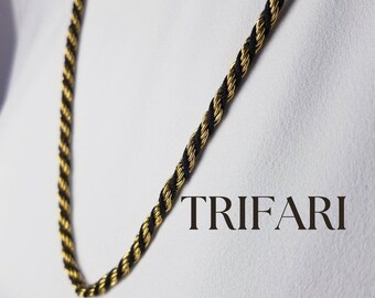 Genuine Trifari gold tone & black necklace.