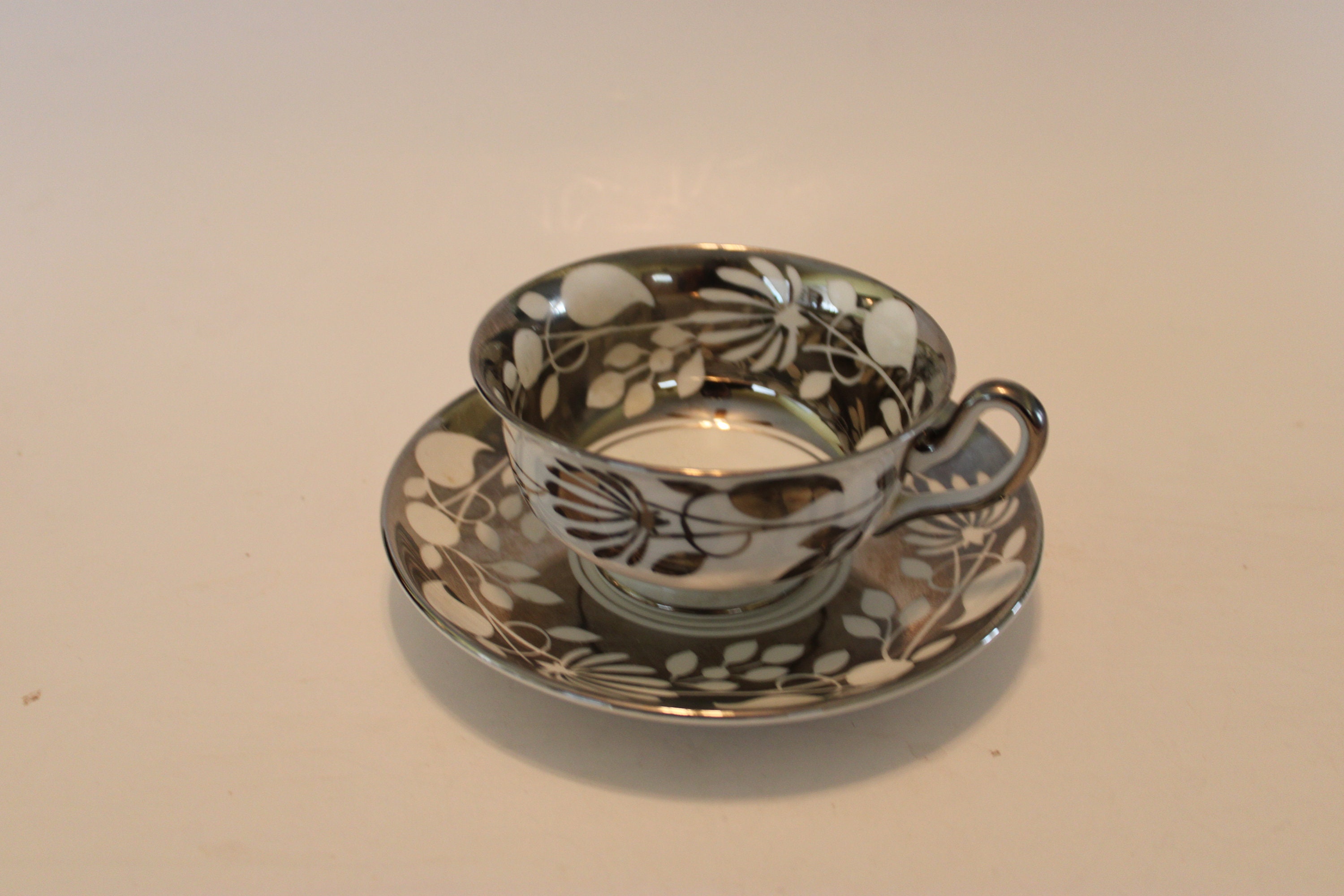 Royal Chelsea English Bone China Teacup and Saucer, Silver and 