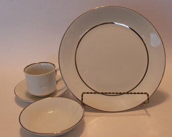 Beautiful Salem Dinnerware Boxed set of four items - cup saucer, small plate, dinner plate. Original box