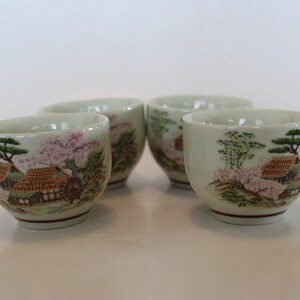 Set of FOUR Japanese tea cups, with a rural mill scene, 5oz capacity