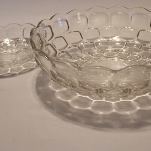 Sold as a set, 5.5&quot; and 9.5&quot; round glass bowls with square design and scalloped edges