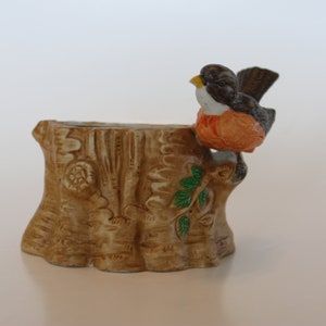 Small indoor planter, imported by Lipco, American robin on a tree stump
