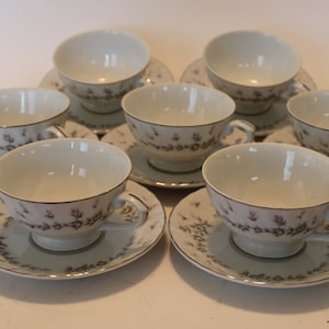 Style House Fine China teacups and saucers, &#39;Picardy&#39;, set of SEVEN