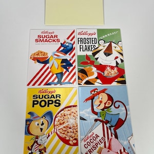 May include: Four vintage cereal boxes featuring Kellogg's Sugar Smacks, Frosted Flakes, Sugar Pops, and Cocoa Krispies. Each box features a cartoon mascot and a bowl of cereal.