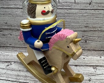 Rocking Horse Nutcracker Snow Globe: Holiday Christmas Decor
