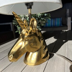 Unicorn Lamp Golden tone table lamp with lamp shade