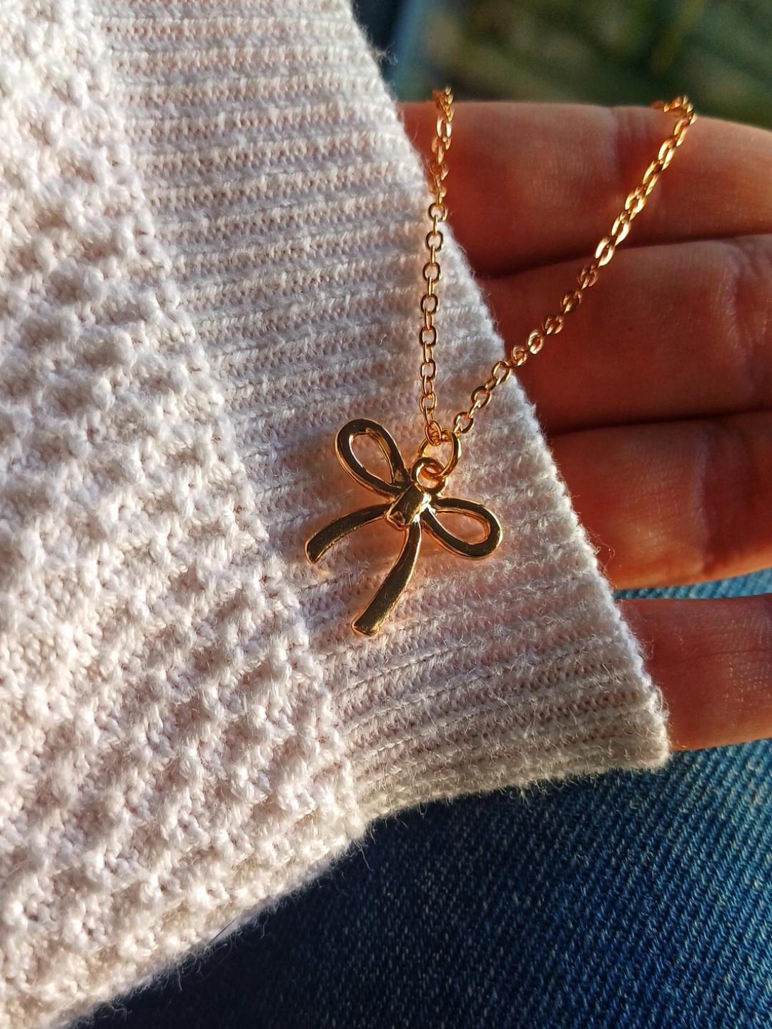 Ciondoli con fiocco in oro, ciondolo a cuore con fiocco in oro 18k