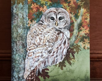 May include: A painting of a gray owl perched on a branch with a background of fall leaves in shades of orange, yellow, and red.