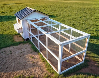May include: White wooden chicken coop with a large, enclosed run. The coop has a metal roof and a nesting box. The run is made of wire mesh and has a dirt floor.