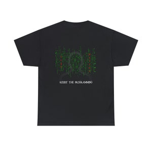 May include: Black t-shirt with a green and red digital code design and the text "Resist the Programming" printed on the back.