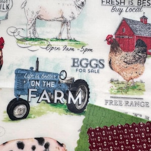 May include: A white fabric featuring farm-themed illustrations including a blue tractor with the text Life is better ON THE FARM, a red barn, a sheep, a chicken, and text reading Open 9am-5pm, EGGS FOR SALE, and FRESH IS BEST Buy Local.
