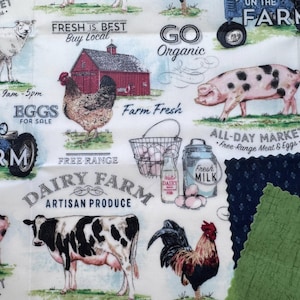 May include: A white fabric with a farm theme, featuring illustrations of a red barn, cow, pig, rooster, and eggs. Text includes "Farm Fresh," "Dairy Farm," and "Eggs for Sale."