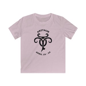 May include: A light pink t-shirt with a black graphic of the Taurus zodiac symbol and the text "ARITAU APRIL 19-24".