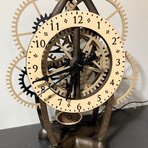 Reloj de péndulo electromagnético Steve Peterson SP7, con engranajes expuestos, impreso en 3D (se conecta a la corriente).