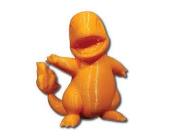 May include: Orange 3D printed figurine of a Pokemon character with a tail shaped like a flame.
