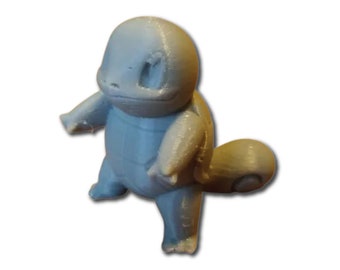 May include: A light blue 3D printed figurine of a Squirtle Pokemon. The figurine is standing on its hind legs with its tail curled around its body.