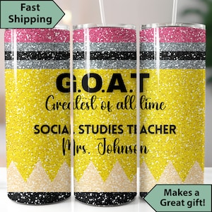 May include: A yellow and black glitter tumbler with a pencil design. The tumbler has the text "G.O.A.T. Greatest of all time Social Studies Teacher Mrs. Johnson" on it.