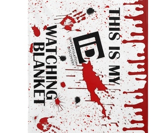 May include: White blanket with red blood splatters and handprints. The text "This is my watching blanket" is written in black. The logo for Investigation Discovery is in the centre.
