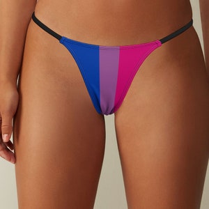 May include: A blue, purple and pink striped bikini bottom with thin black straps.