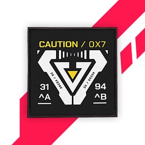 以下が含まれることがあります： 白と黄色の幾何学模様の黒い正方形のパッチ。パッチには「CAUTION / OX7」の文字と、その他の数字とアルファベットのマークが付いています。黄色の三角形がデザインの中央にあります。