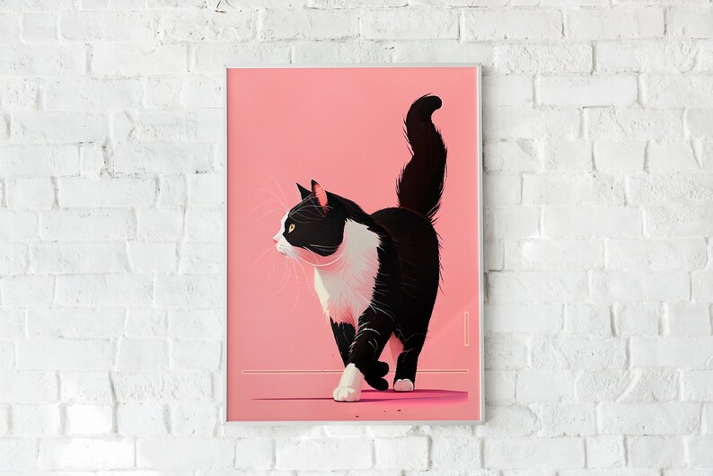 May include: A framed art print featuring a stylized illustration of a black and white cat on a pink background. The cat is depicted walking with its tail up. The artwork is displayed against a white brick wall.