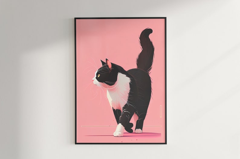 May include: A framed art print featuring a stylized illustration of a black and white cat walking to the left. The cat has a white chest and face with yellow eyes. The background is a solid pink color.