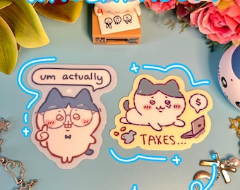 May include: Two cartoon cat stickers with a yellow background. The first sticker features a cat wearing glasses and a bow tie with the text "um actually" in a speech bubble. The second sticker features a cat with a laptop and a speech bubble that says "TAXES..." with a dollar sign. Both stickers are waterproof.