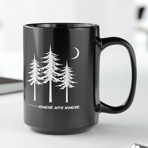 Wander with Wonder Black Mug, 15oz,  Ceramic Coffee Mug for Nature Lovers and Explorers, Inspirational Graphic Mug with Pine Trees