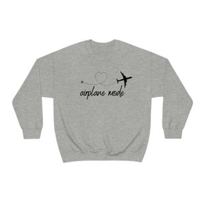 Bluza z okrągłym dekoltem w stylu samolotowym zdjęcie 6
