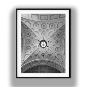 May include: Black and white photograph of a framed ceiling with intricate geometric patterns. A circular chandelier hangs from the center. The ceiling design features octagons, squares, and other shapes.