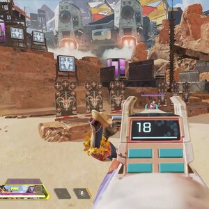 Op de afbeelding: Een videogamescherm dat een first-person perspectief toont van een speler die een wapen richt op een schietbaan. De schietbaan heeft meerdere doelen met rode bullseyes. De score van de speler is 18. De game is Apex Legends.