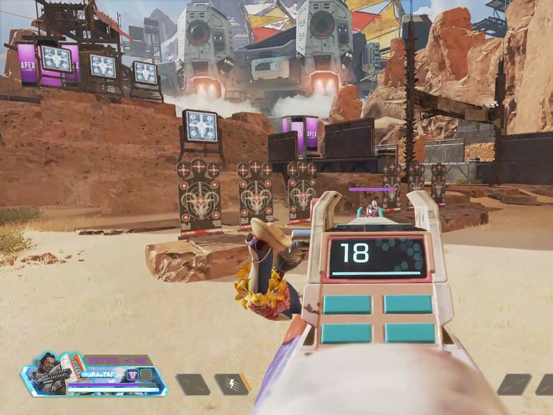 May include: A video game screen showing a first-person perspective of a player aiming a pink and white weapon at a target range. The weapon has a digital display that reads "18".
